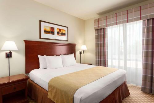 Imagen de la habitación del Hotel Country Inn and Suites By Radisson, Tifton, Ga. Foto 13