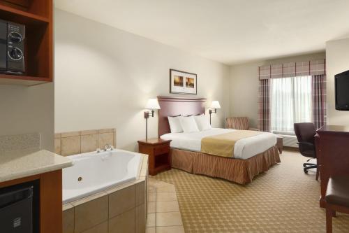 Imagen de la habitación del Hotel Country Inn and Suites By Radisson, Tifton, Ga. Foto 15