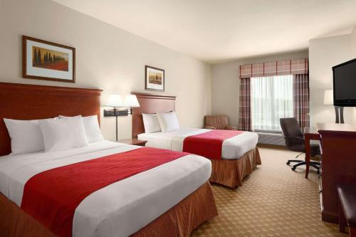 Imagen de la habitación del Hotel Country Inn and Suites By Radisson, Tifton, Ga. Foto 16