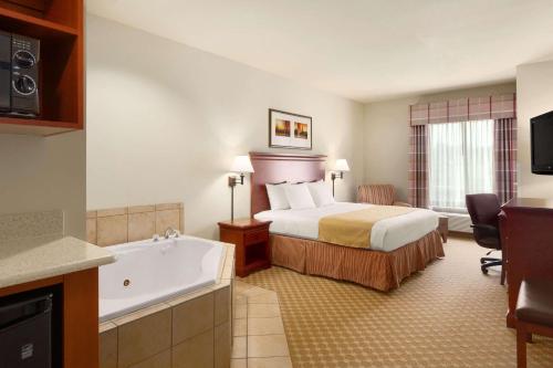 Imagen de la habitación del Hotel Country Inn and Suites By Radisson, Tifton, Ga. Foto 19