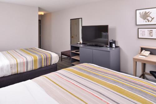 Imagen de la habitación del Hotel Country Inn and Suites By Radisson, Tinley Park, Il. Foto 6