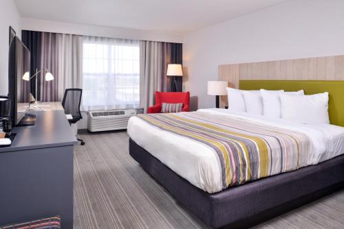 Imagen de la habitación del Hotel Country Inn and Suites By Radisson, Tinley Park, Il. Foto 7