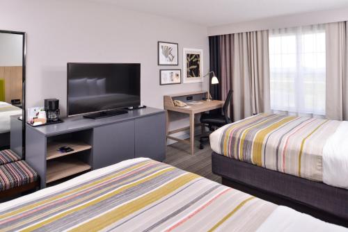 Imagen de la habitación del Hotel Country Inn and Suites By Radisson, Tinley Park, Il. Foto 10