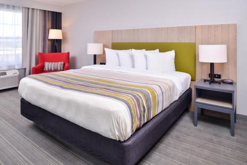 Imagen de la habitación del Hotel Country Inn and Suites By Radisson, Tinley Park, Il. Foto 12