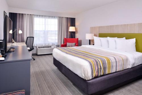 Imagen de la habitación del Hotel Country Inn and Suites By Radisson, Tinley Park, Il. Foto 16