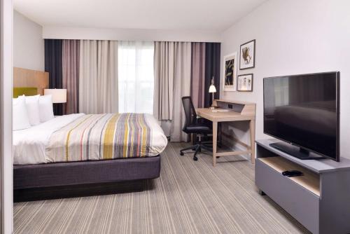 Imagen de la habitación del Hotel Country Inn and Suites By Radisson, Tinley Park, Il. Foto 17