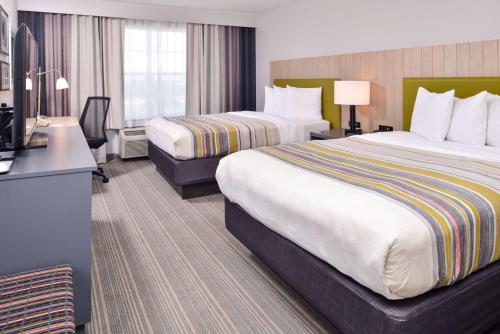 Imagen de la habitación del Hotel Country Inn and Suites By Radisson, Tinley Park, Il. Foto 19
