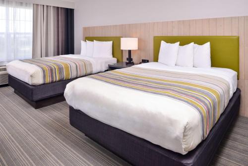 Imagen de la habitación del Hotel Country Inn and Suites By Radisson, Tinley Park, Il. Foto 20