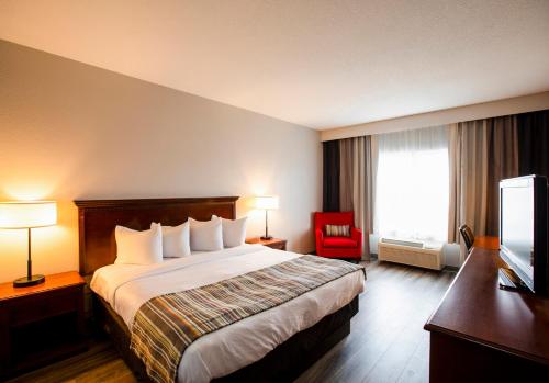 Imagen de la habitación del Hotel Country Inn and Suites By Radisson, Wilson, Nc. Foto 12