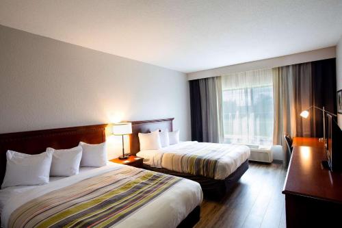 Imagen de la habitación del Hotel Country Inn and Suites By Radisson, Wilson, Nc. Foto 14