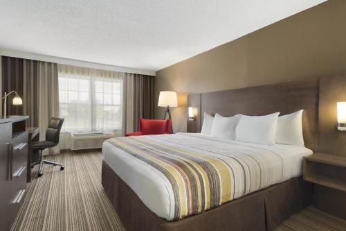 Imagen de la habitación del Hotel Country Inn and Suites by Radisson, Ankeny. Foto 18