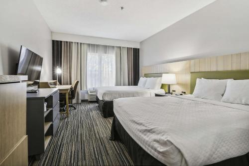 Imagen de la habitación del Hotel Country Inn and Suites by Radisson, Chicago O'Hare South, IL. Foto 19
