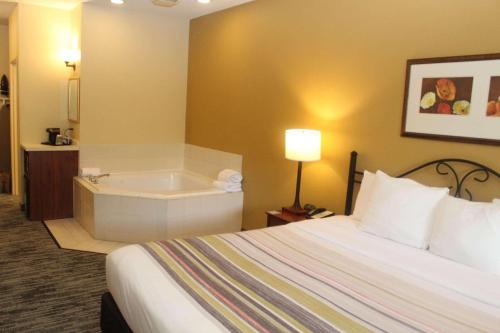 Imagen de la habitación del Hotel Country Inn and Suites by Radisson, Crystal Lake, IL. Foto 16