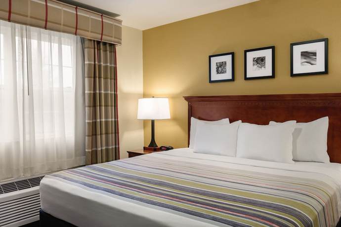Imagen de la habitación del Hotel Country Inn and Suites by Radisson, Dakota Dunes, SD. Foto 11