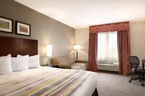 Imagen de la habitación del Hotel Country Inn and Suites by Radisson, Dearborn. Foto 10
