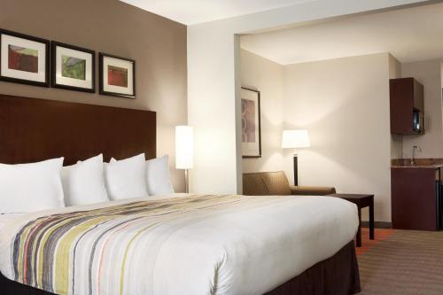 Imagen de la habitación del Hotel Country Inn and Suites by Radisson, Dearborn. Foto 11