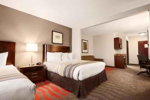 Imagen de la habitación del Hotel Country Inn and Suites by Radisson, Dearborn. Foto 17