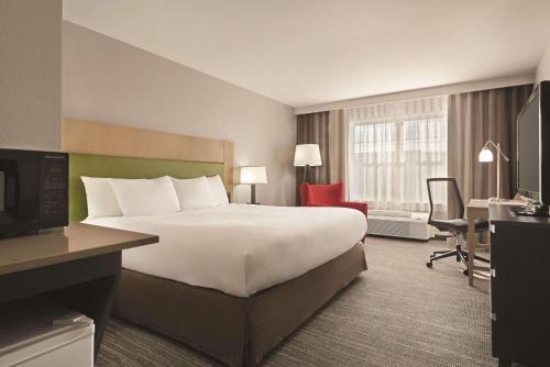 Imagen de la habitación del Hotel Country Inn and Suites by Radisson, Dubuque, IA. Foto 11