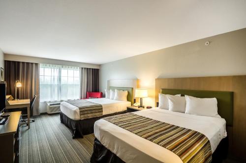 Imagen de la habitación del Hotel Country Inn and Suites by Radisson, Fond du Lac, WI. Foto 2
