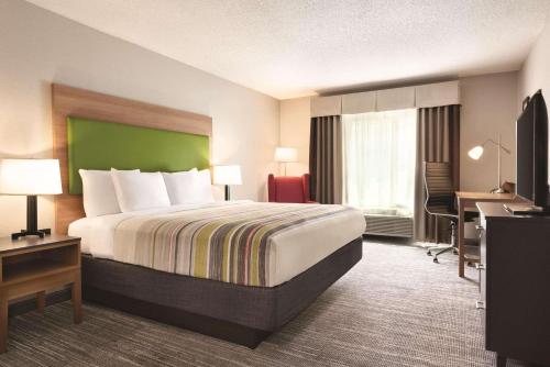 Imagen de la habitación del Hotel Country Inn and Suites by Radisson, Greensboro. Foto 13