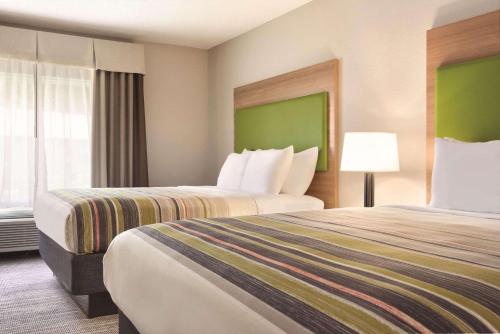 Imagen de la habitación del Hotel Country Inn and Suites by Radisson, Greensboro. Foto 14