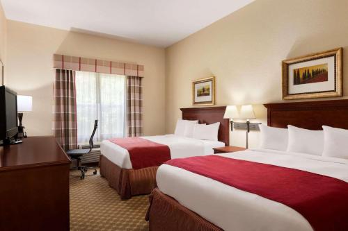 Imagen de la habitación del Hotel Country Inn and Suites by Radisson, Macon North, GA. Foto 16