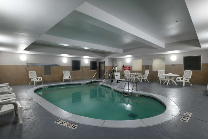 Imagen de la piscina del Hotel Country Inn and Suites by Radisson, Oklahoma City Airport, OK. Foto 20