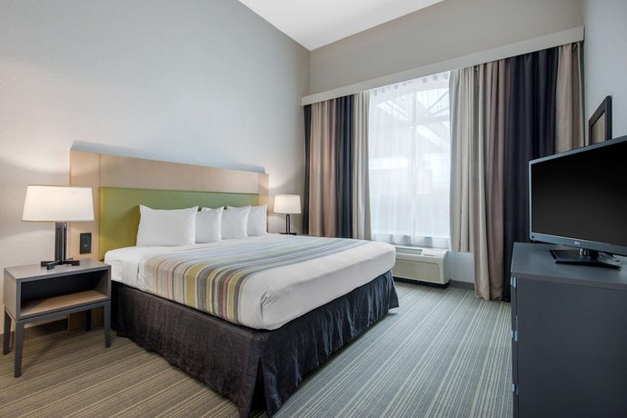 Imagen de la habitación del Hotel Country Inn and Suites by Radisson, Port Canaveral, FL. Foto 4