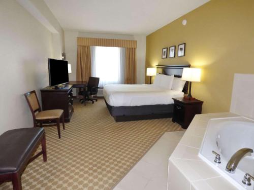 Imagen de la habitación del Hotel Country Inn and Suites by Radisson, Port Orange-Daytona, FL. Foto 16