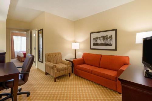 Imagen de la habitación del Hotel Country Inn and Suites by Radisson, Port Orange-Daytona, FL. Foto 17