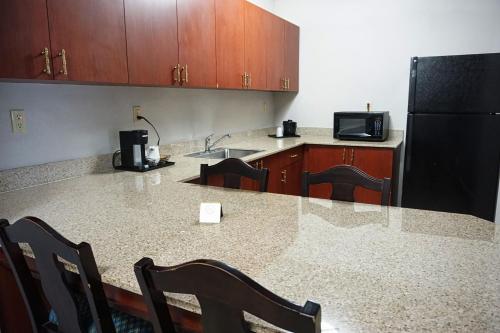 Imagen de la habitación del Hotel Country Inn and Suites by Radisson, Tampa/Brandon, FL. Foto 11