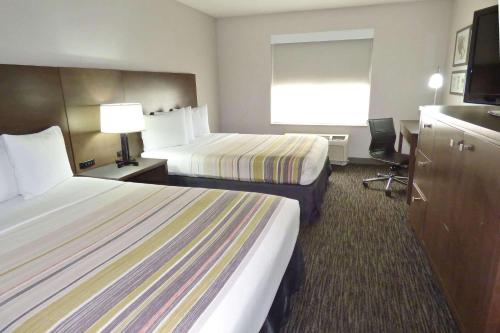 Imagen de la habitación del Hotel Country Inn and Suites by Radisson, Tampa/Brandon, FL. Foto 15