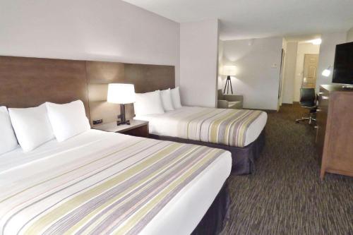 Imagen de la habitación del Hotel Country Inn and Suites by Radisson, Tampa/Brandon, FL. Foto 17