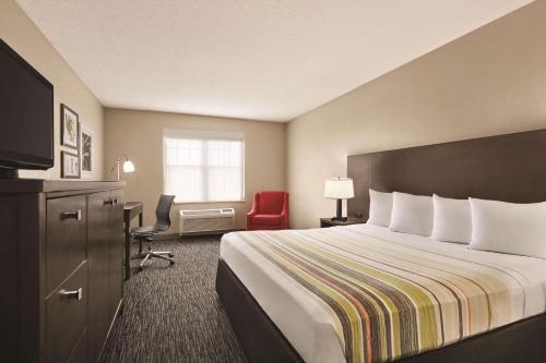 Imagen de la habitación del Hotel Country Inn and Suites by Radisson, Tampa/Brandon, FL. Foto 18