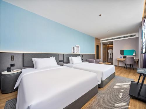 Imagen de la habitación del Hotel Country Inn&Suites By Radisson, Xi'an Bell and Drum Tower Flagship. Foto 11