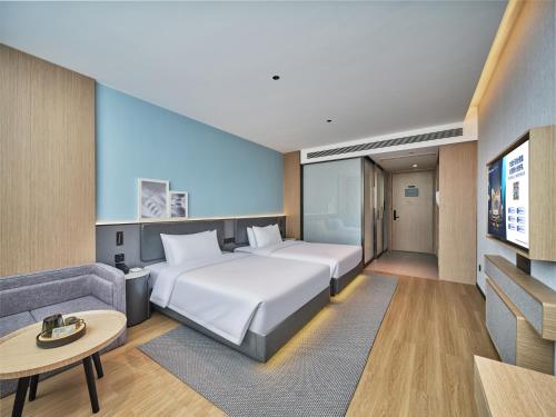 Imagen de la habitación del Hotel Country Inn&Suites By Radisson, Xi'an Bell and Drum Tower Flagship. Foto 15