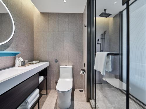 Imagen de la habitación del Hotel Country Inn&Suites By Radisson, Xi'an Bell and Drum Tower Flagship. Foto 17