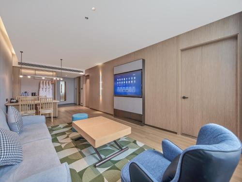 Imagen de la habitación del Hotel Country Inn&Suites By Radisson, Xi'an Bell and Drum Tower Flagship. Foto 19
