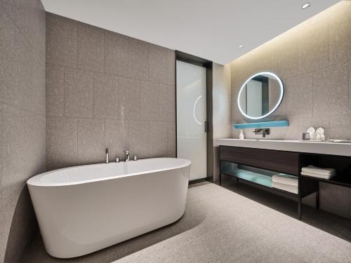 Imagen de la habitación del Hotel Country Inn&Suites By Radisson, Xi'an Bell and Drum Tower Flagship. Foto 20