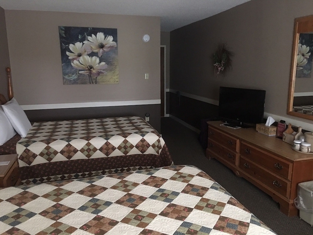 Imagen de la habitación del Hotel Country Living Inn. Foto 4