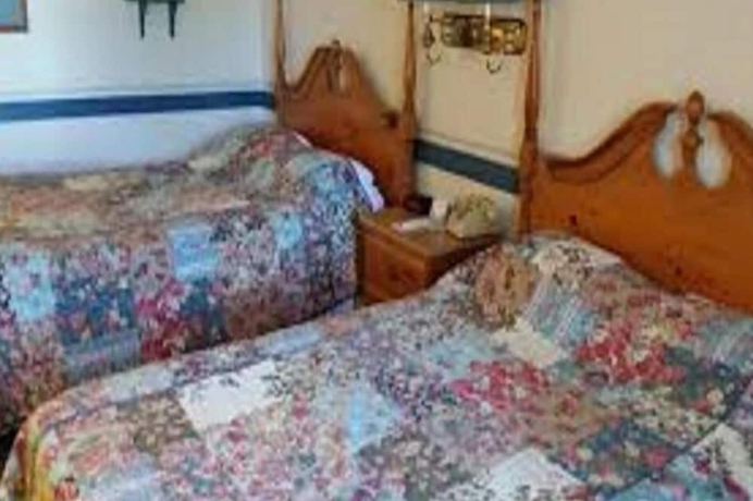 Imagen de la habitación del Hotel Country Living Inn. Foto 12
