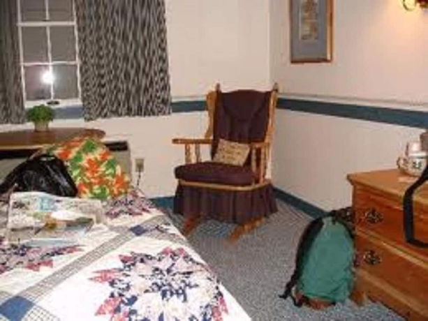 Imagen de la habitación del Hotel Country Living Inn. Foto 13