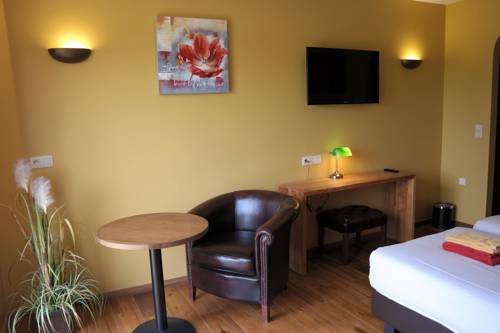 Imagen de la habitación del Hotel Country Lodge Moriaanshoofd. Foto 11