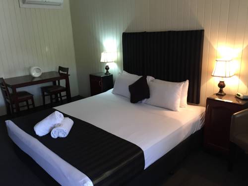 Imagen de la habitación del Hotel Country Plaza Motor Inn. Foto 2