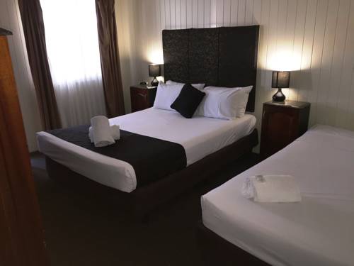 Imagen de la habitación del Hotel Country Plaza Motor Inn. Foto 6