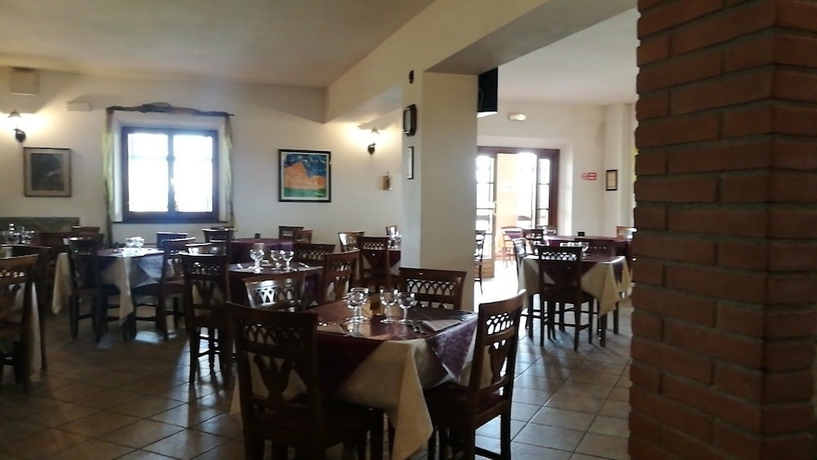 Imagen del bar/restaurante del Hotel Country Resort Al Poggio Dei Papi. Foto 4