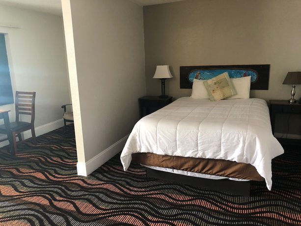 Imagen de la habitación del Hotel Country Town N Suites. Foto 8
