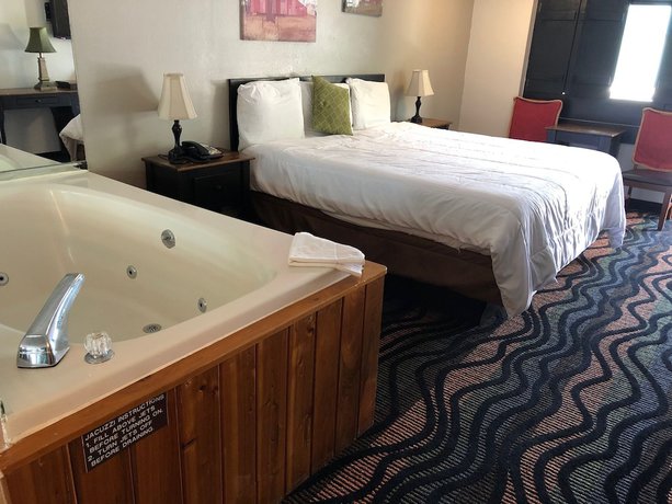 Imagen de la habitación del Hotel Country Town N Suites. Foto 10