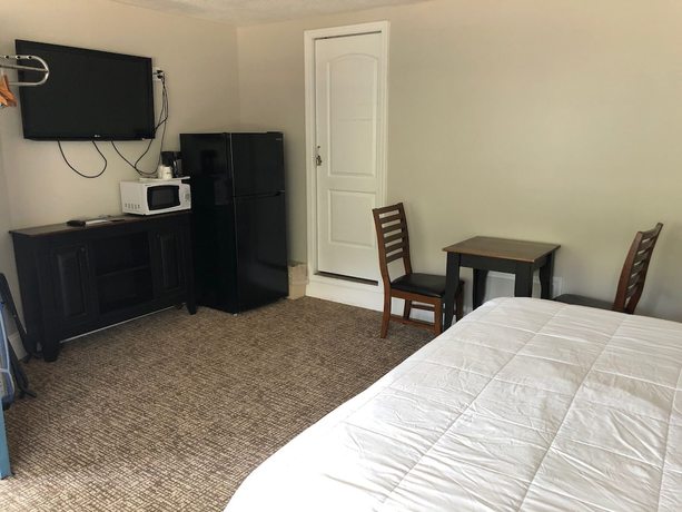 Imagen de la habitación del Hotel Country Town N Suites. Foto 16
