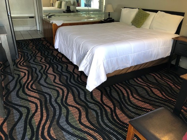 Imagen de la habitación del Hotel Country Town N Suites. Foto 17